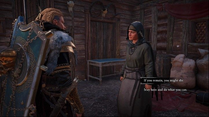 The hooded figure will eventually stop, and you will be able to speak with them - Assassins Creed Valhalla: The Village Jurthgard - Eurvicscire - Assassins Creed Valhalla Guide and Walkthrough
